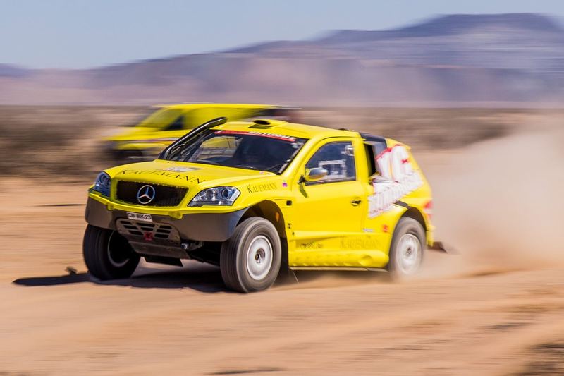 Rally raid buggy jumping over desert dunes in the Atacama, Chile (photo 2 of 36)