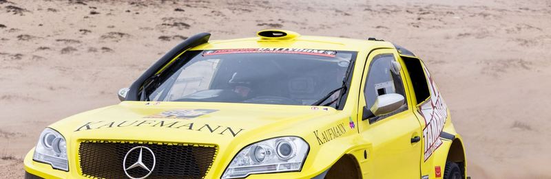 Rally raid buggy jumping over desert dunes in the Atacama, Chile (photo 9 of 36)