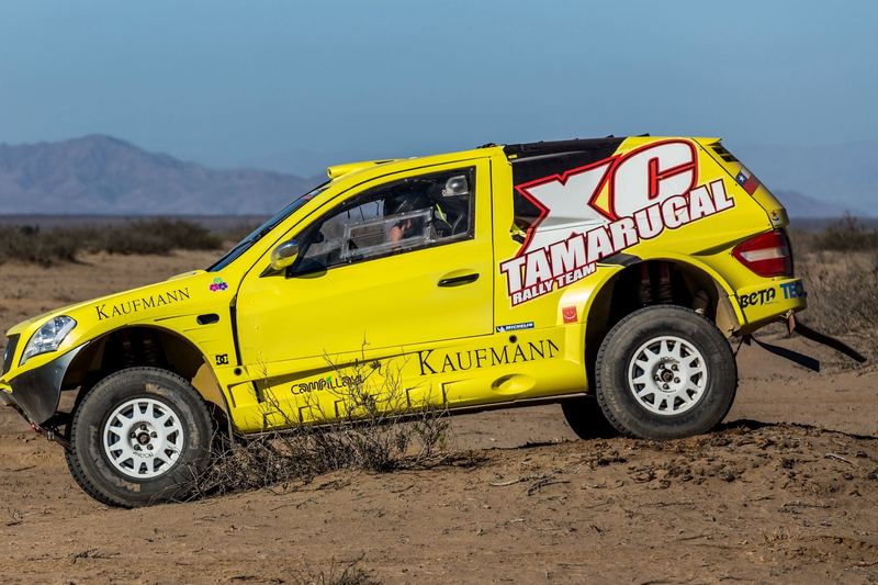 Rally raid buggy jumping over desert dunes in the Atacama, Chile (photo 13 of 36)