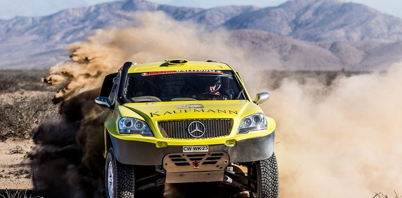 Rally raid buggy jumping over desert dunes in the Atacama, Chile (photo 16 of 36)