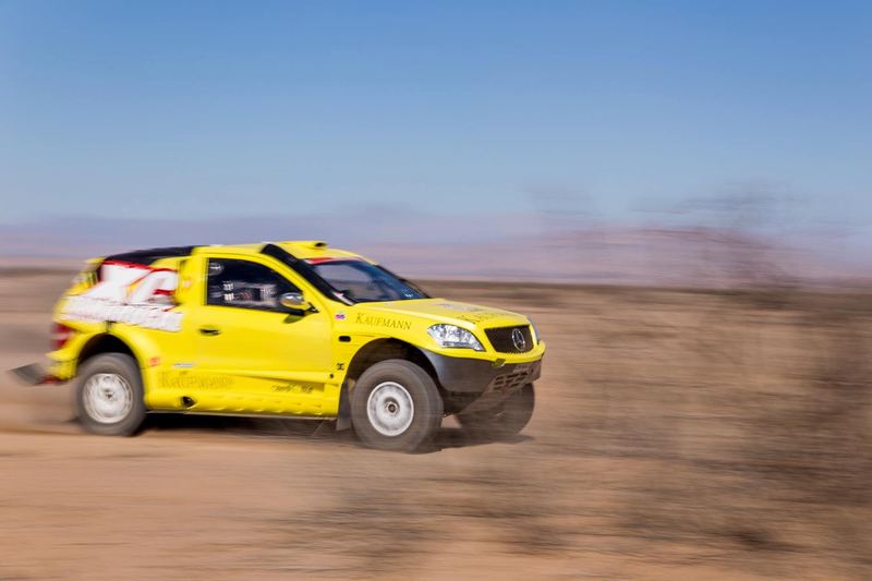 Rally raid buggy jumping over desert dunes in the Atacama, Chile (photo 32 of 36)