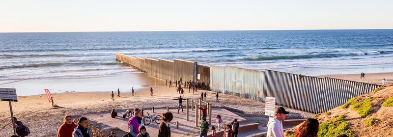 The border fence running into the Pacific at Playas de Tijuana at sunset (photo 1 of 17)