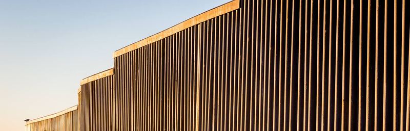 The border fence running into the Pacific at Playas de Tijuana at sunset (photo 6 of 17)