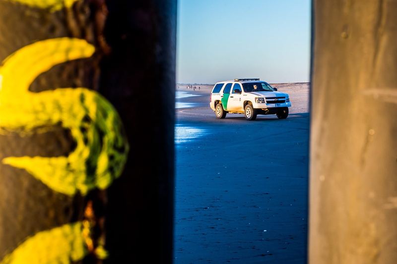 The border fence running into the Pacific at Playas de Tijuana at sunset (photo 10 of 17)
